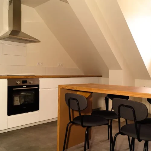 Photo de l'espace cuisine d'un appartement en colocation de la résidence étudiante Cosy en Normandie